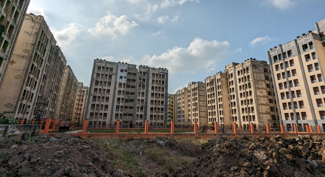 High-rise concrete apartment buildings of the Perumbakkam resettlement colony.